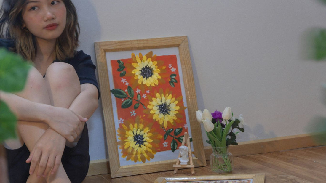 woman in black tank top sitting on chair